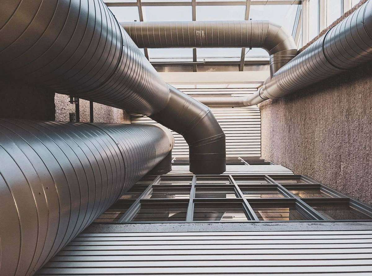 Clean commercial ductwork installed across a ceiling